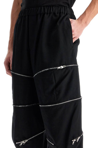 Cropped Pants With Zip Openings.