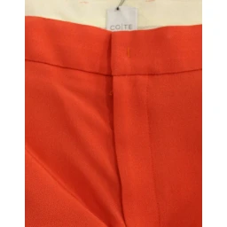 Orange boyfriend stretch pants
