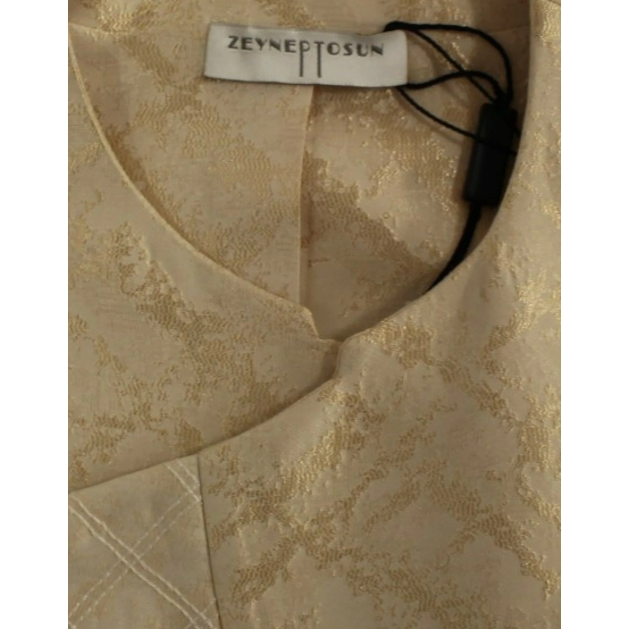 Beige brocade sleeveless jacket