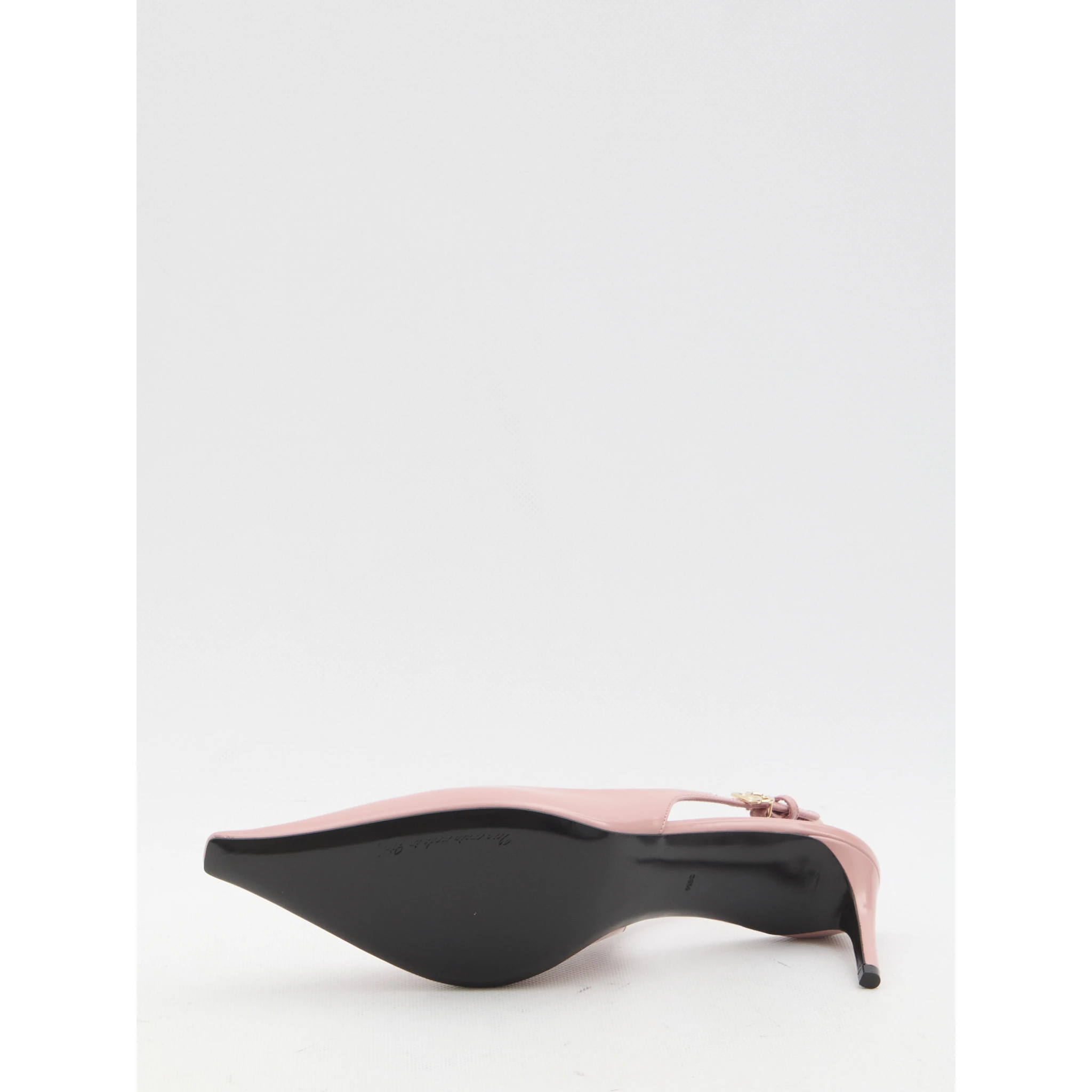 Pointed-toe slingback pumps