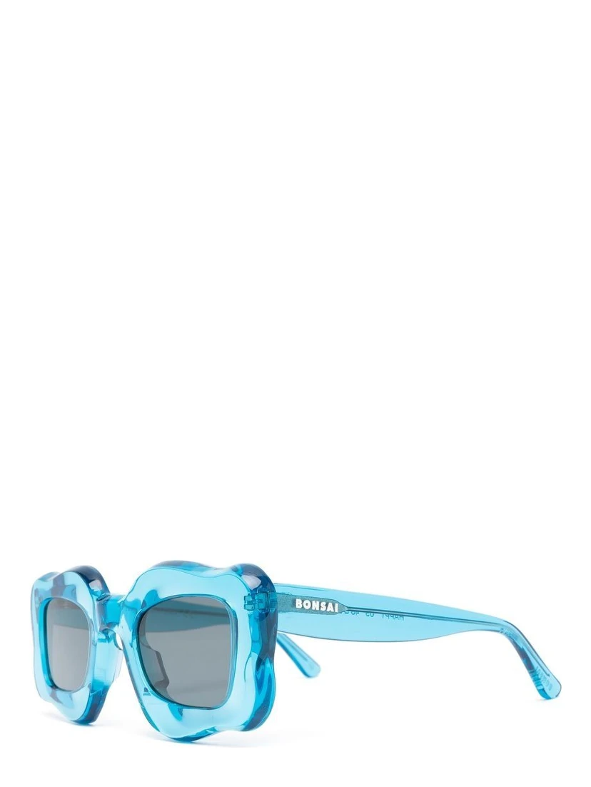 oversized curved-frame sunglasse
