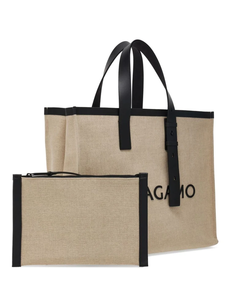 Logo-embossed leather tote bag alternative