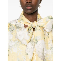 Delicate Floral Playsuit With Removable Belt And Ruffled Edges In Neutrals