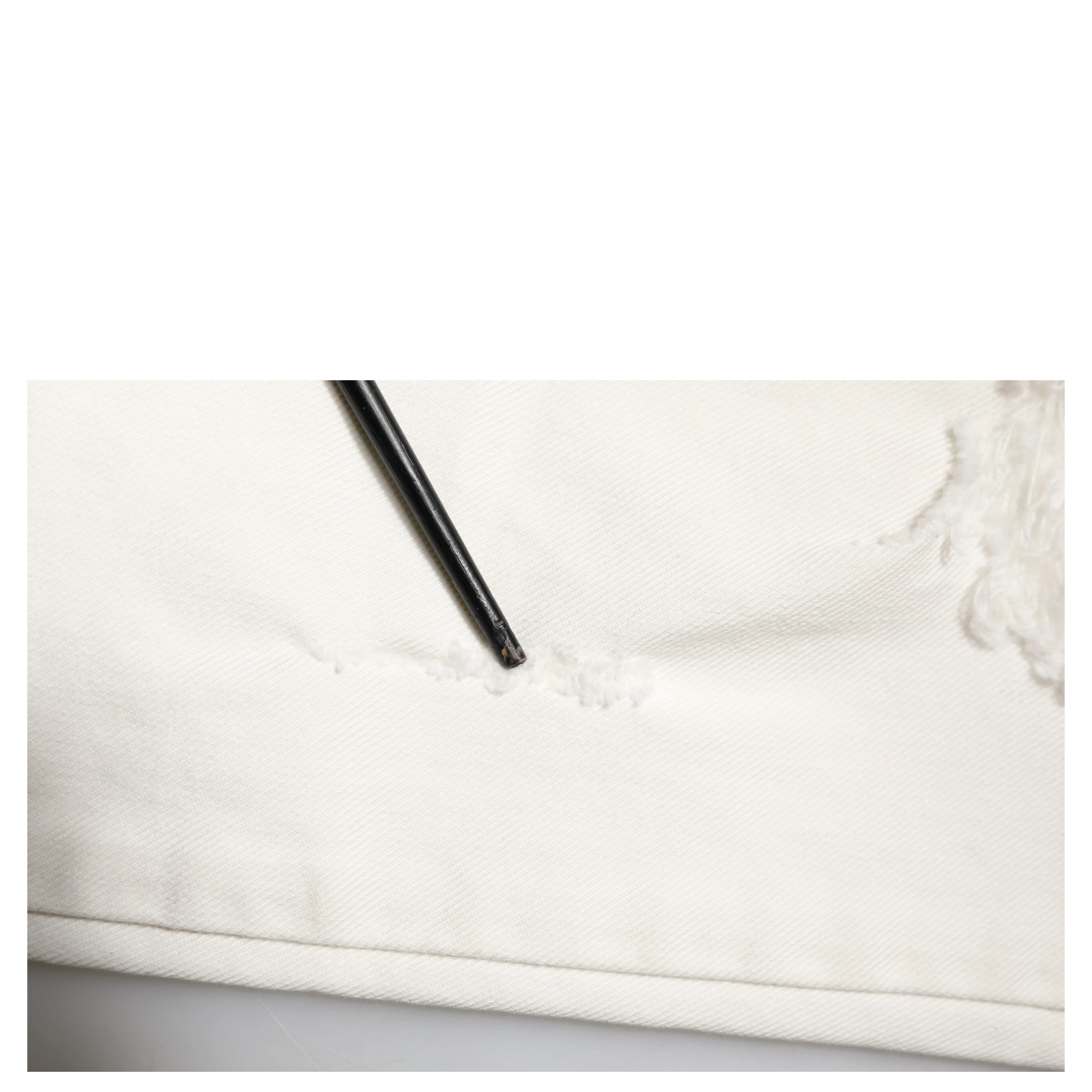 White Tattered Graffiti Skinny Denim Jeans