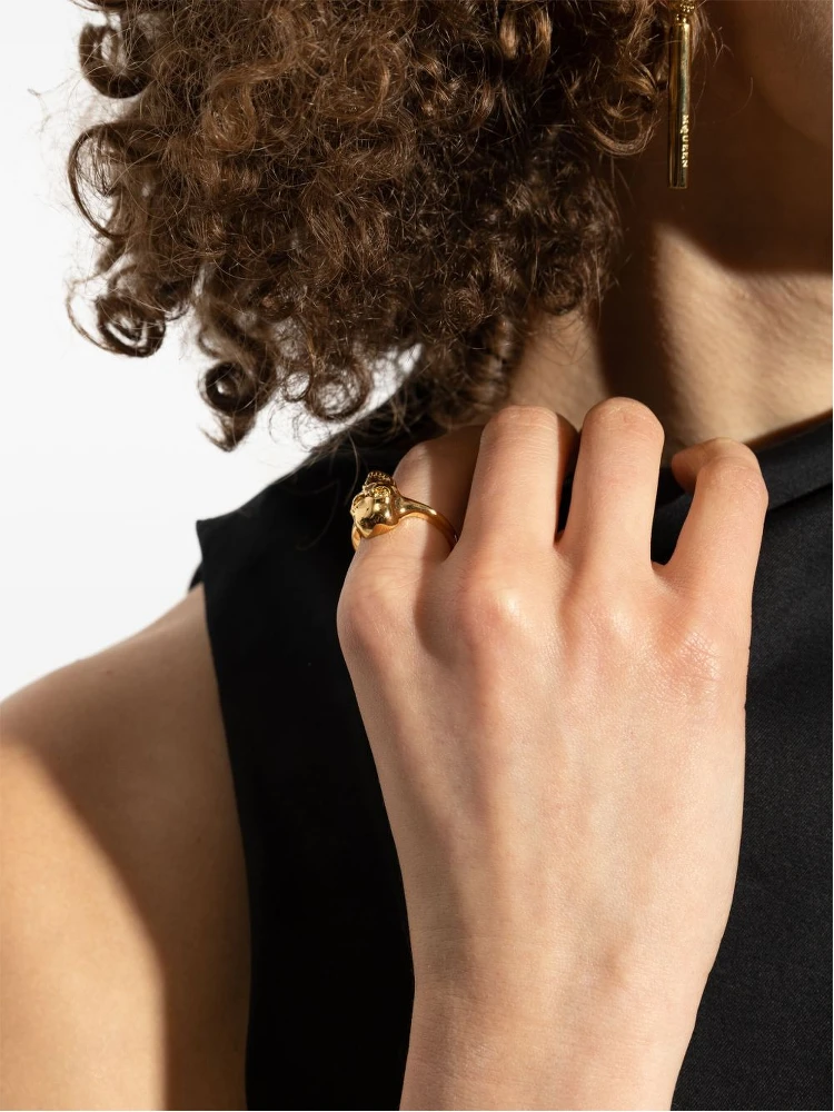 Polished Gold-tone Ring With Engraved Skull Design alternative