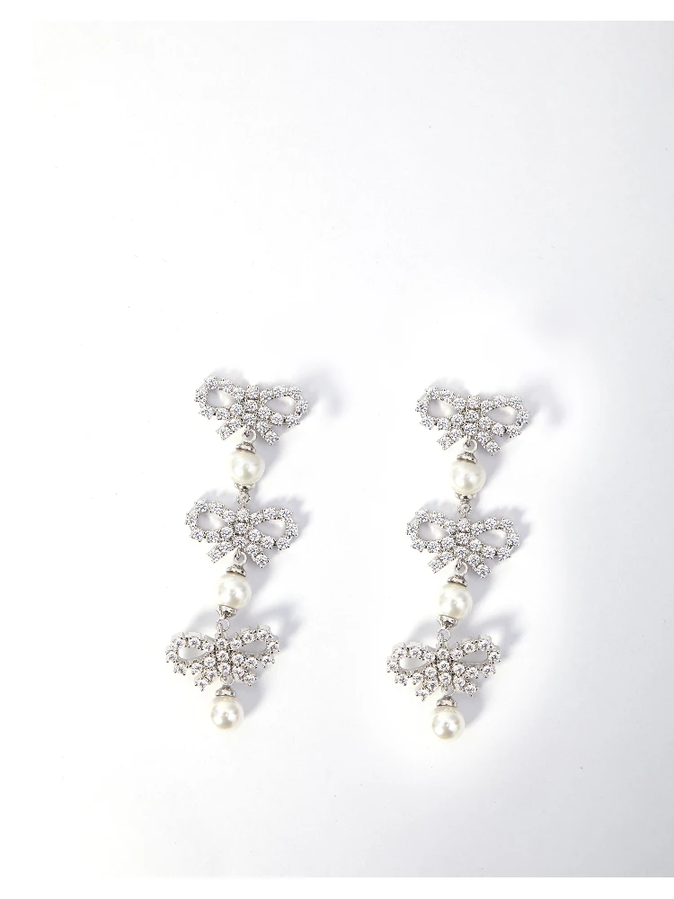 Micro bow pearl tiered earrings