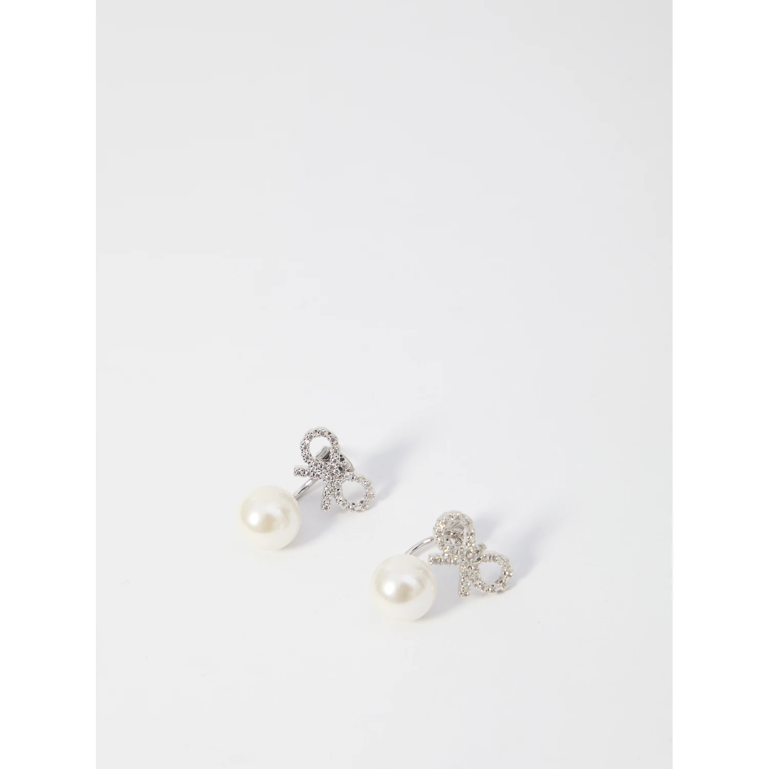 Crystal bow pearl earrings