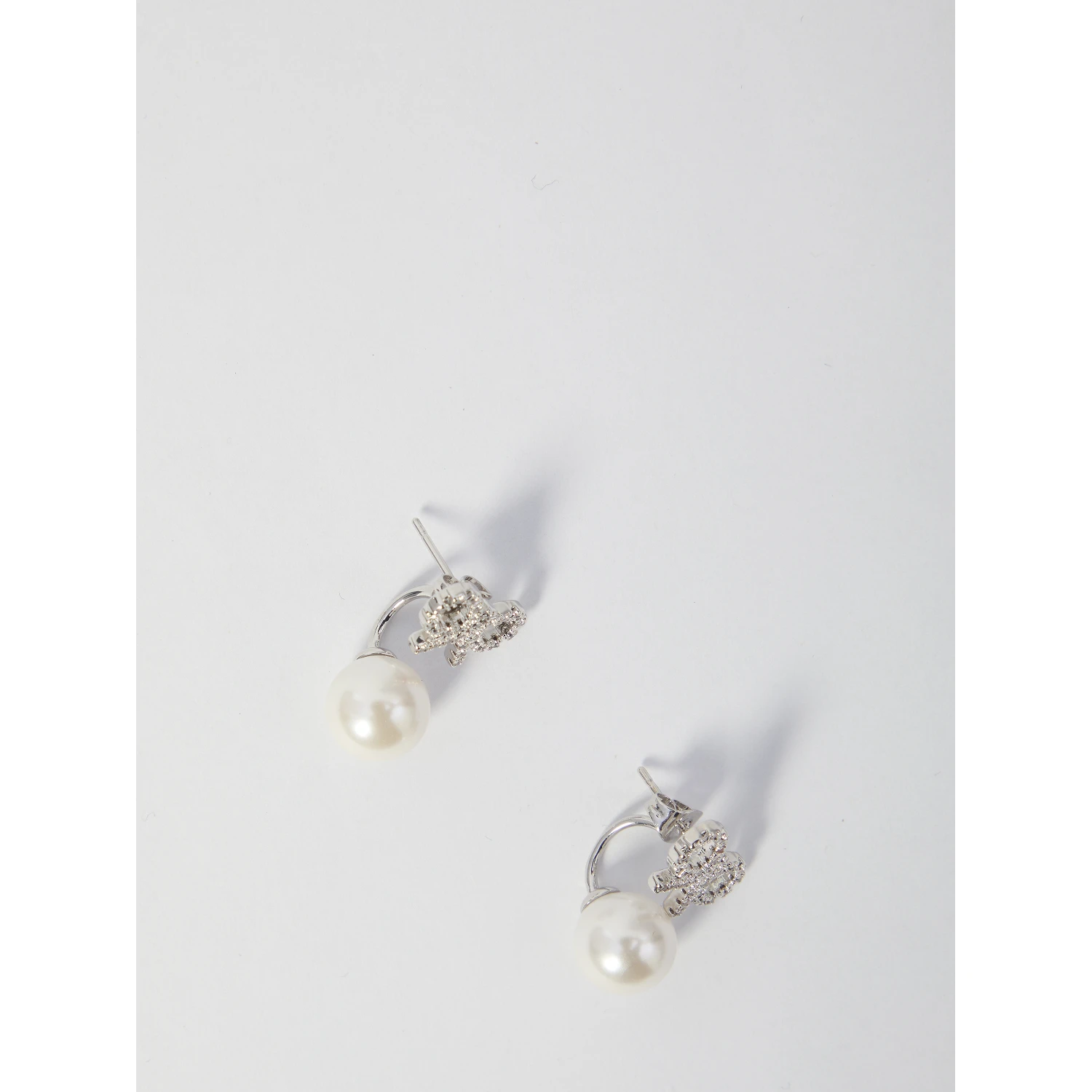 Crystal bow pearl earrings