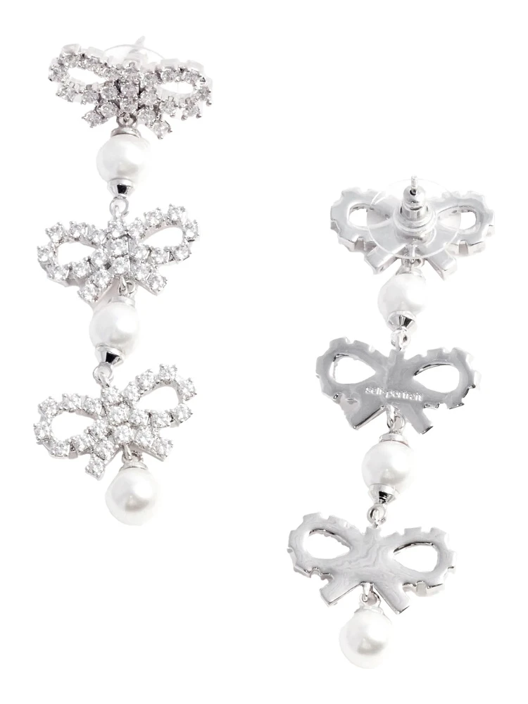 Metallic Tiered Earing with Bow Charm and Crystal Embellishments in Brass Woman alternative