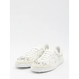 Sneakers embellished with rhinestones