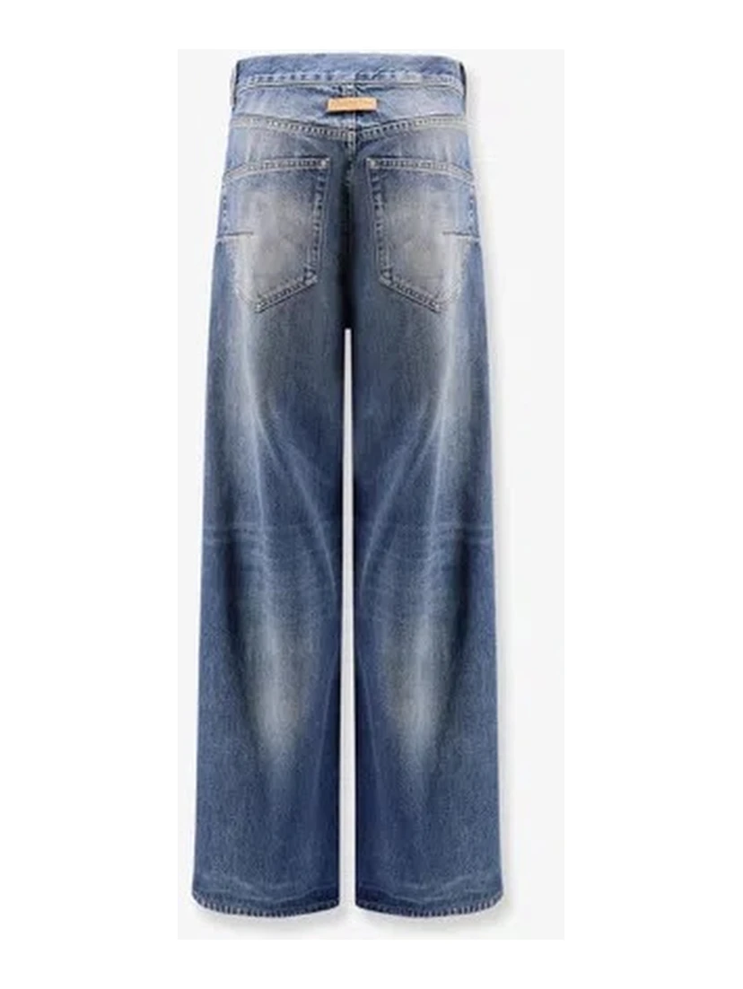Flared jeans with destroyed effect