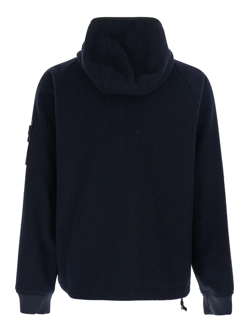 Blue Jacket with Fixed Hood and Logo Patch on the Sleeve in Fleece Man