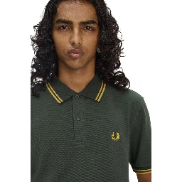 تيشيرتات وبولو من فريد بيري باللون الأخضر