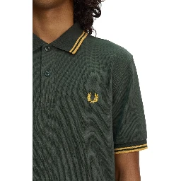 تيشيرتات وبولو من فريد بيري باللون الأخضر