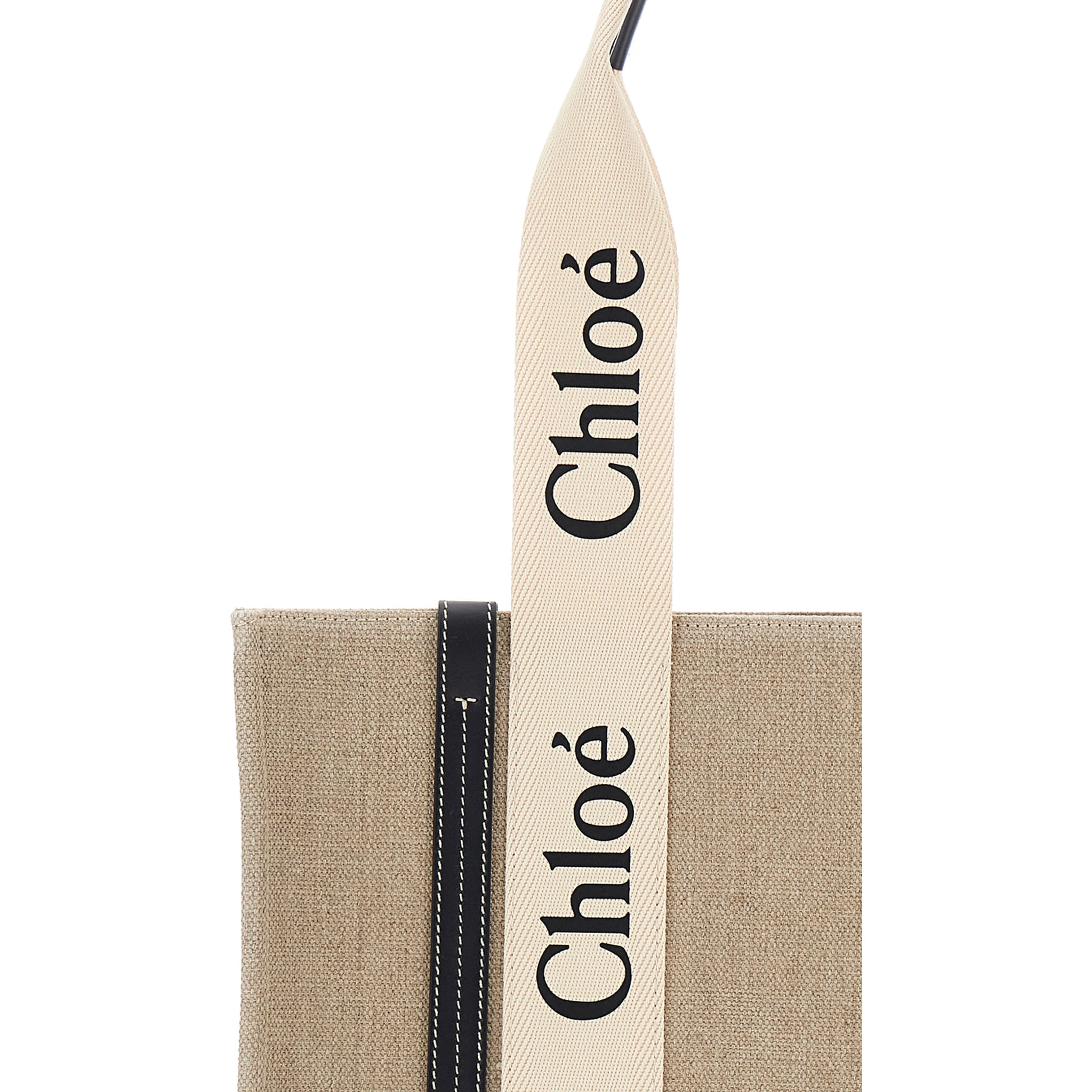 حقيبة يد متوسطة الحجم بلون بيج خشبي مزينة بشعار مكتوب في الأمام، مصنوعة من الكتان، للنساء