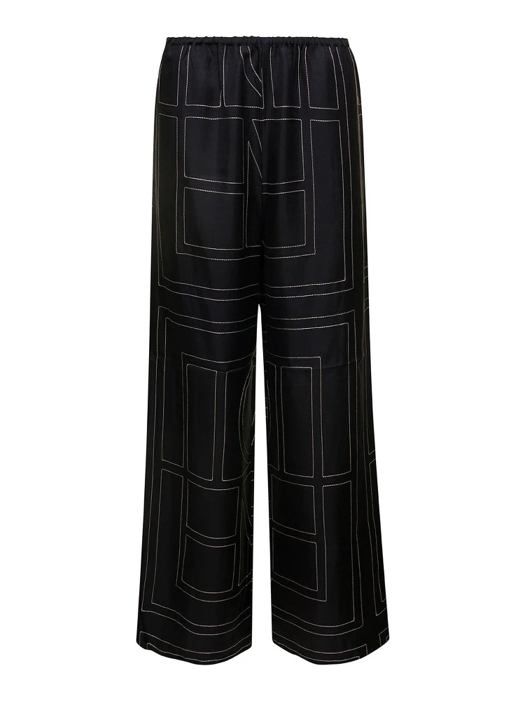 Black Loose Pants with Monogram Print in Silk Woman