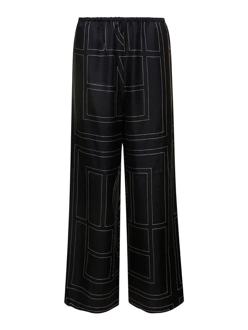 Black Loose Pants with Monogram Print in Silk Woman