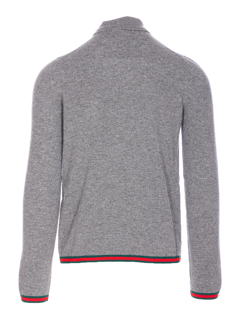 كنزات غوتشي رمادية