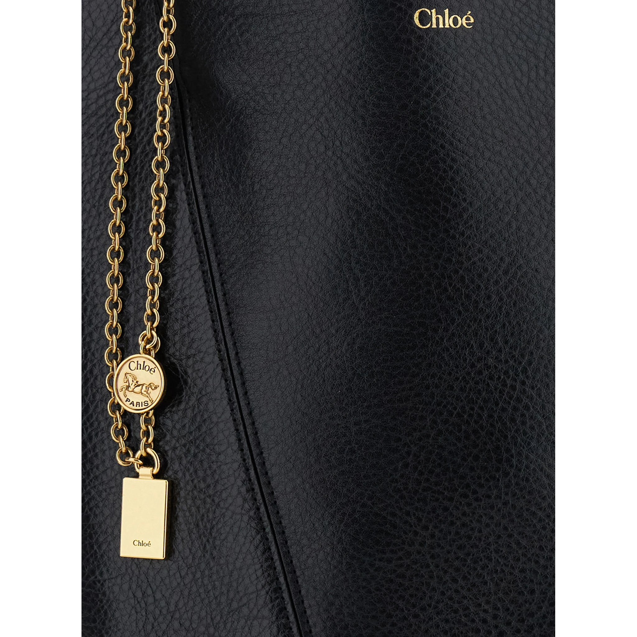 Spin Black Shoulder Bag with Metal Logo Medals in Grained Leather Woman