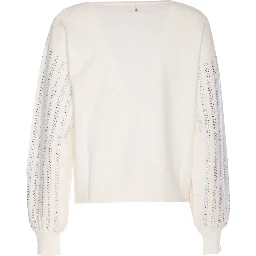 كنزة بأكمام منفوخة مرصعة بأحجار الراين