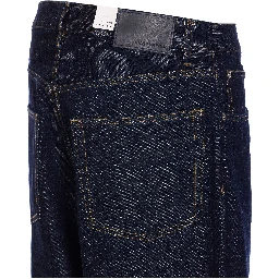 جينز أزرق بزهرة عباد الشمس