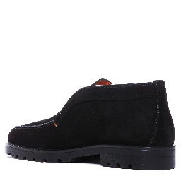 black Santoni slip-on suede boots