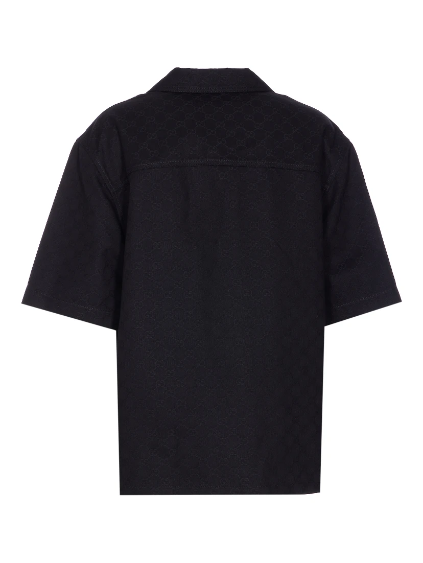 قمصان غوتشي سوداء