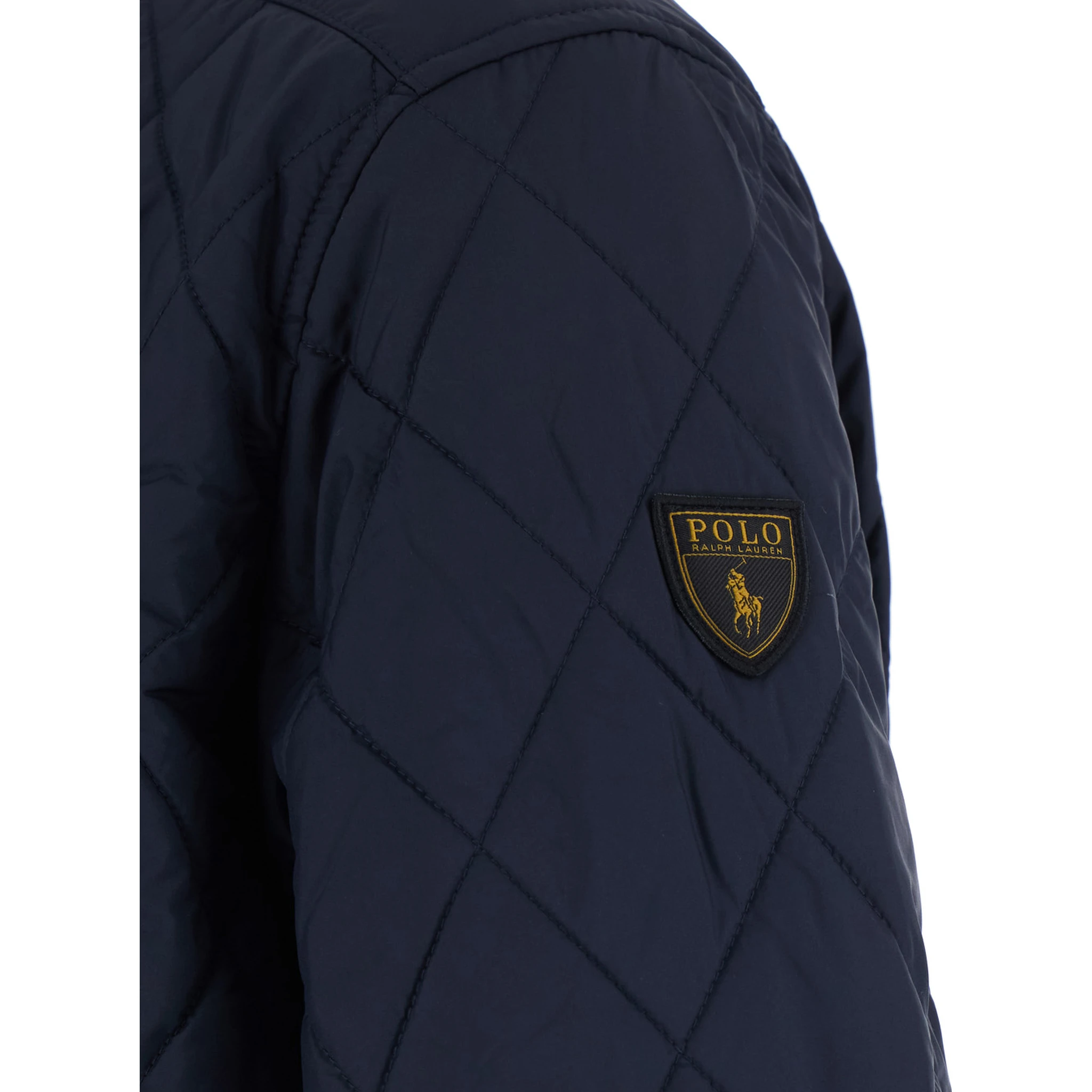 The Beaton Blue Jacket with Corduroy Collar and Logo Patch on the Sleeve in Tech Fabric Man