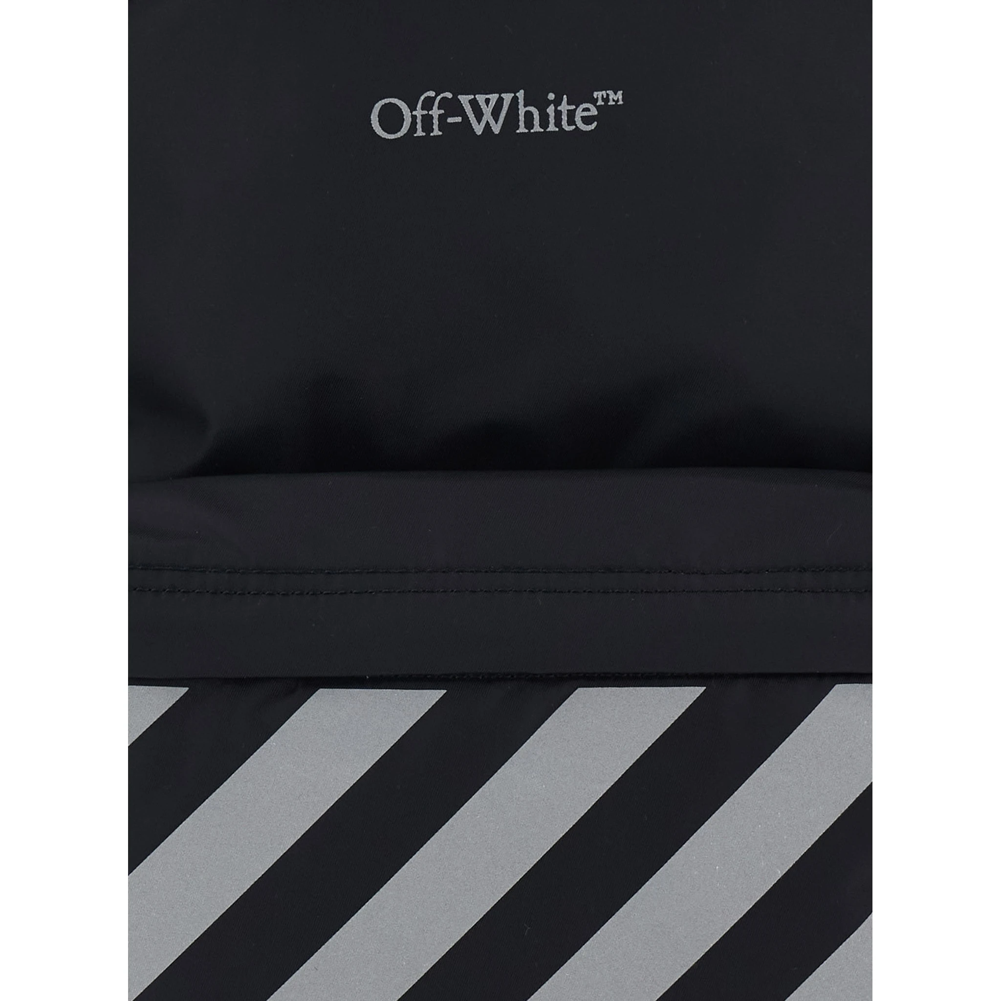Black Backpack with Logo Lettering on the Front and Reflective Stripes on the Front in Fabric Boy