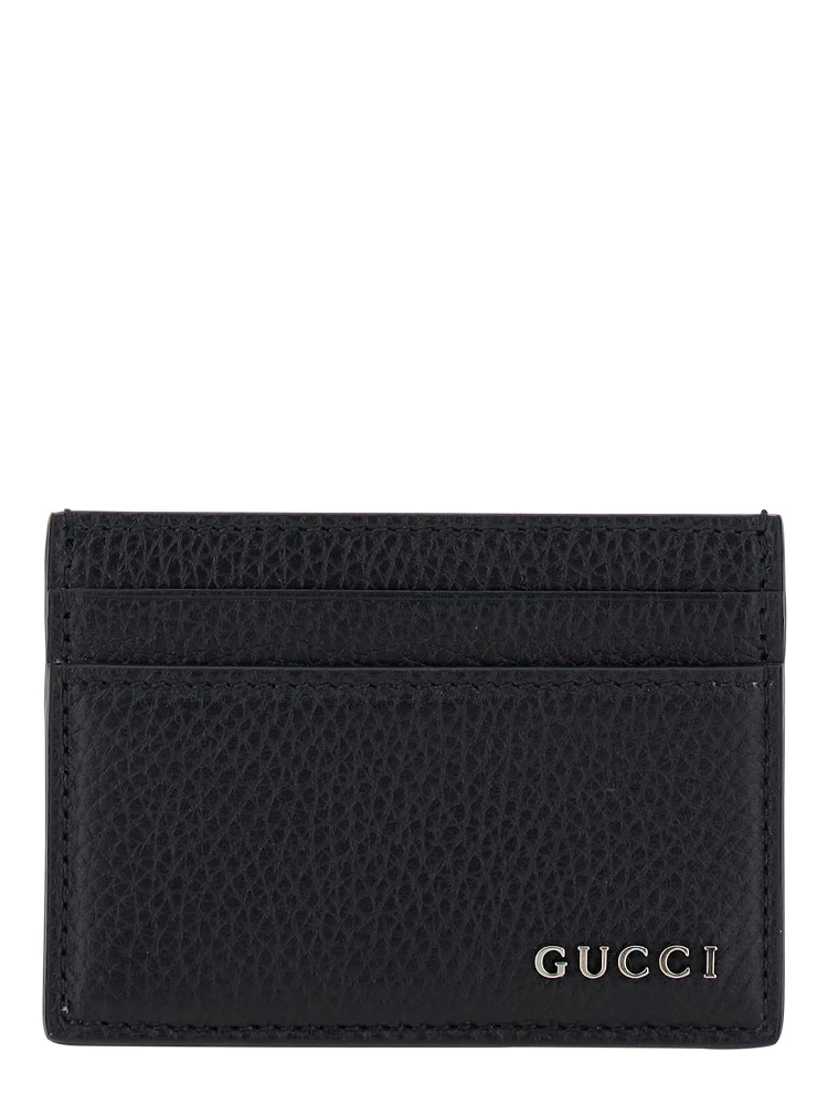 حامل بطاقات أسود بشعار من الجلد المطروق للرجال