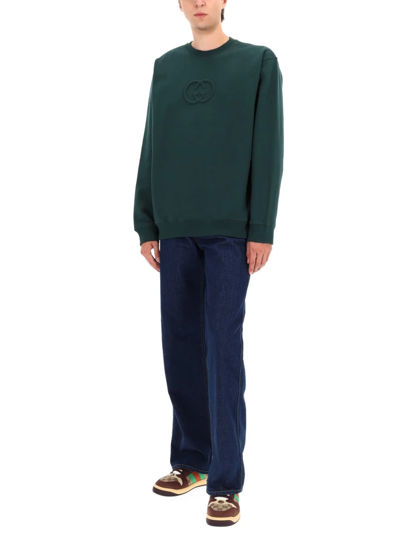 كنزة رياضية بشعار