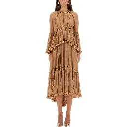 "HYPNOTIC PEPLUM" RUFFLE DRESS