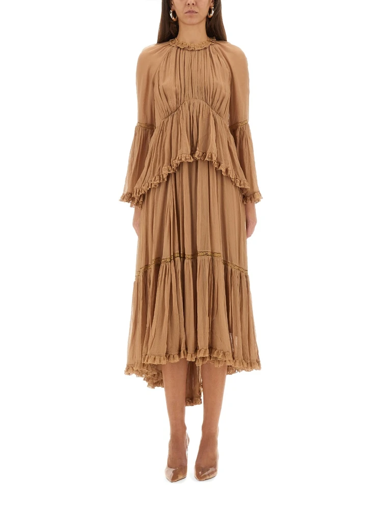 "HYPNOTIC PEPLUM" RUFFLE DRESS