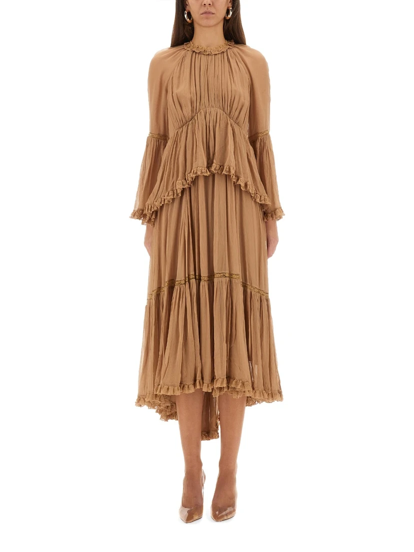 "HYPNOTIC PEPLUM" RUFFLE DRESS