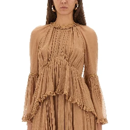 "HYPNOTIC PEPLUM" RUFFLE DRESS