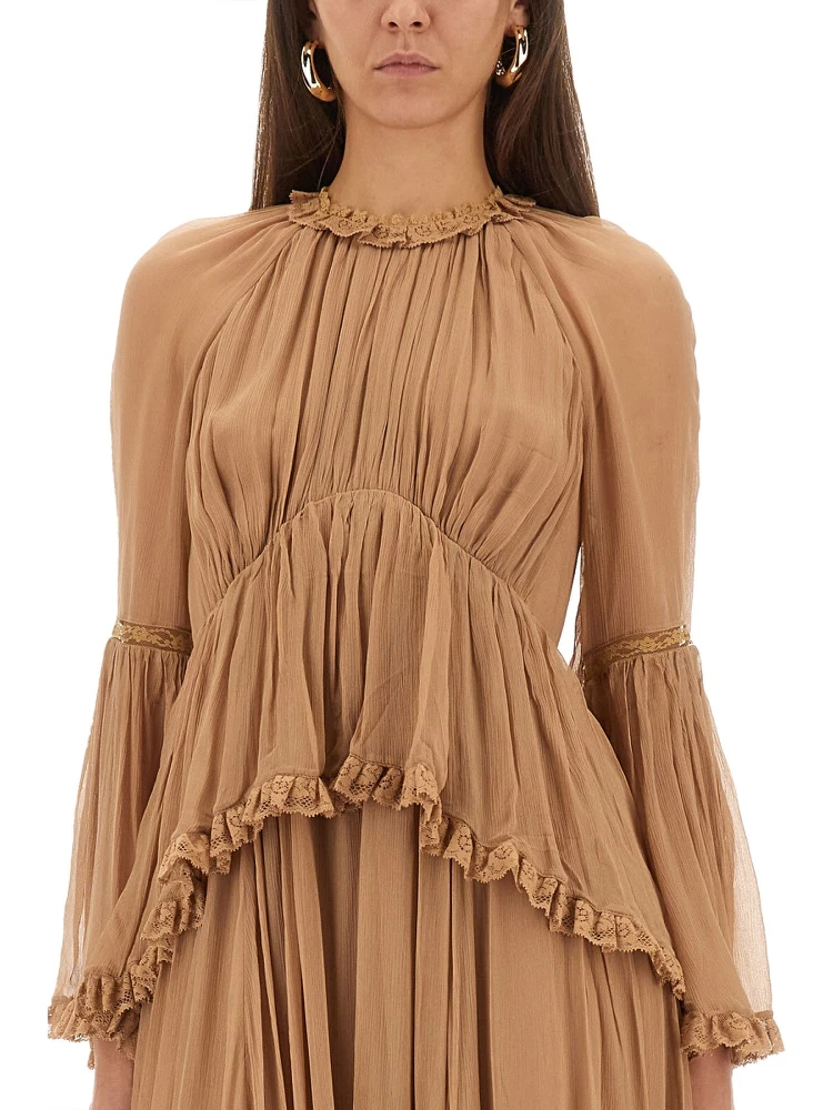"HYPNOTIC PEPLUM" RUFFLE DRESS alternative
