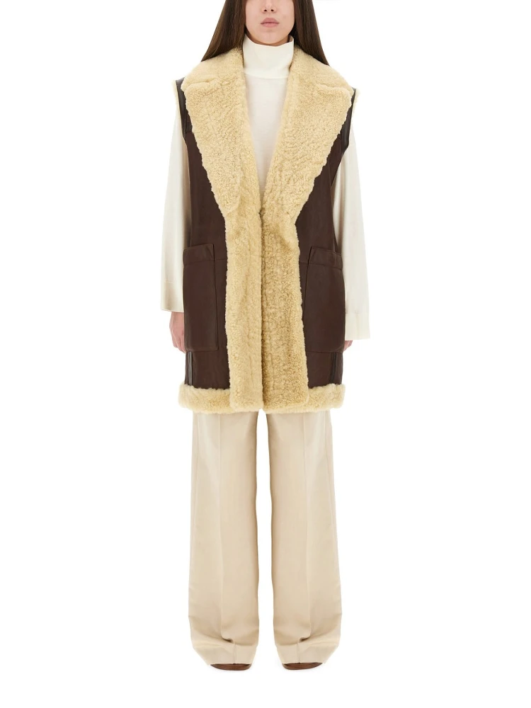 سترة من الجلد والفرو