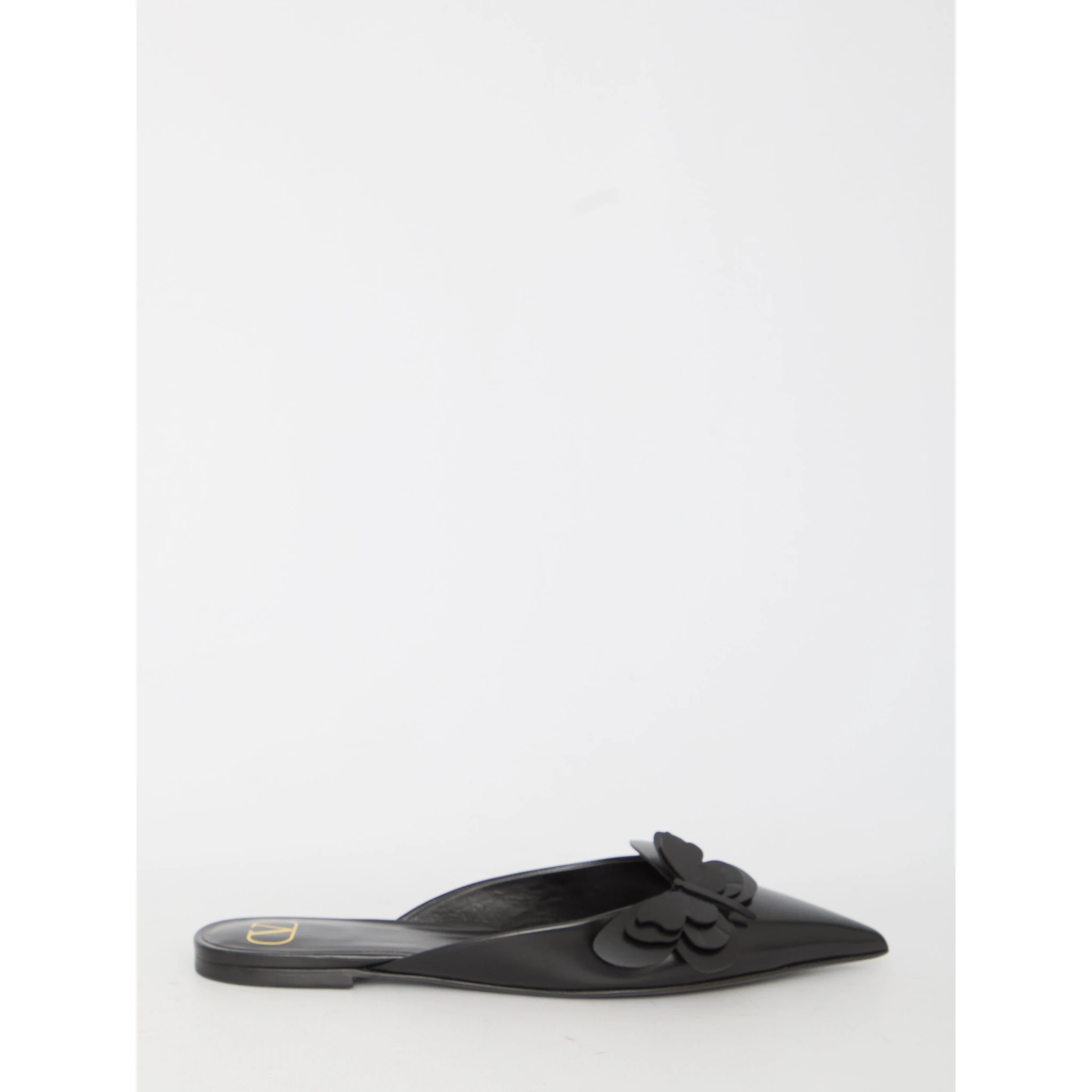 Flat mules in leather