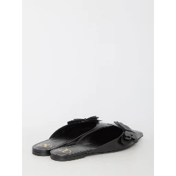 Flat mules in leather