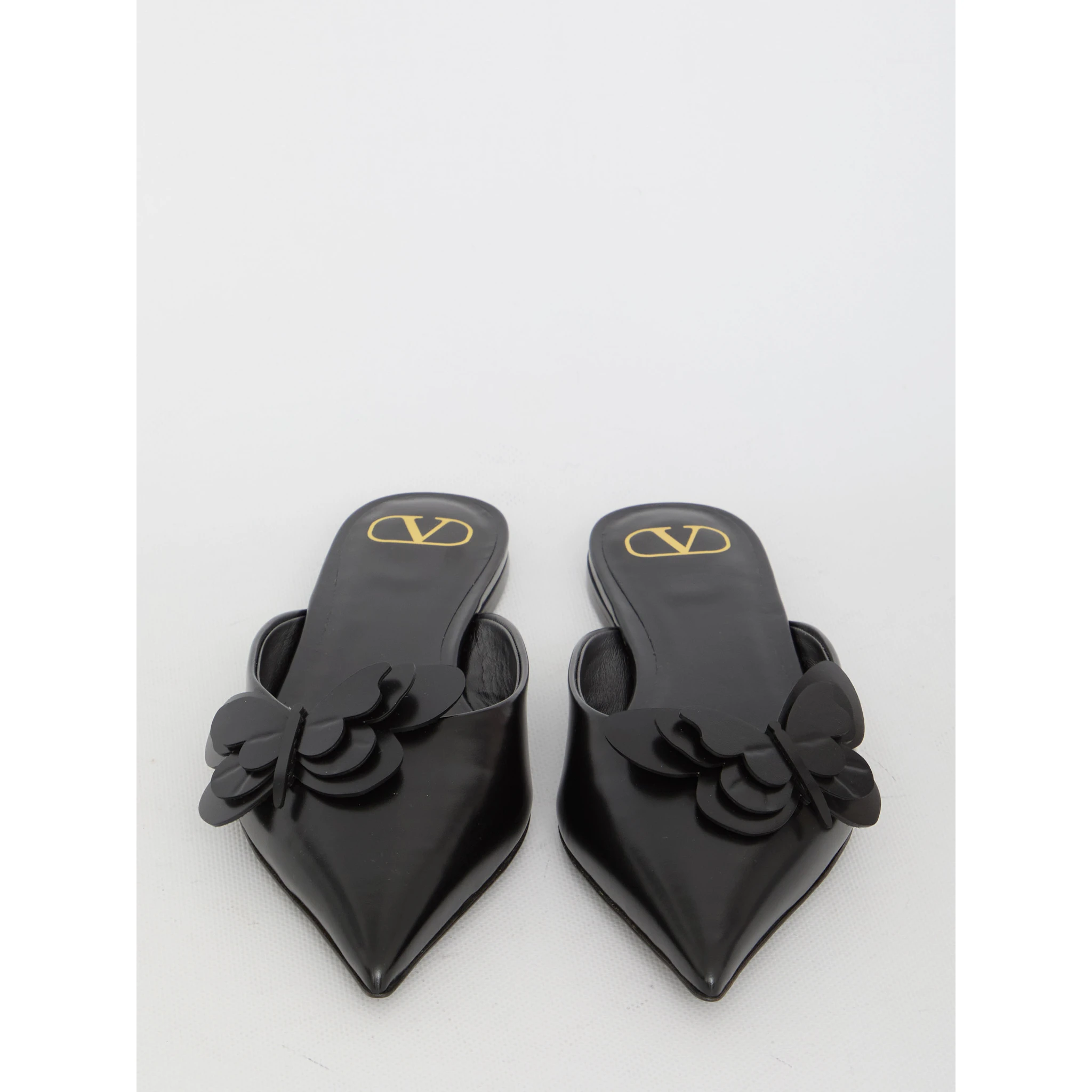 Flat mules in leather