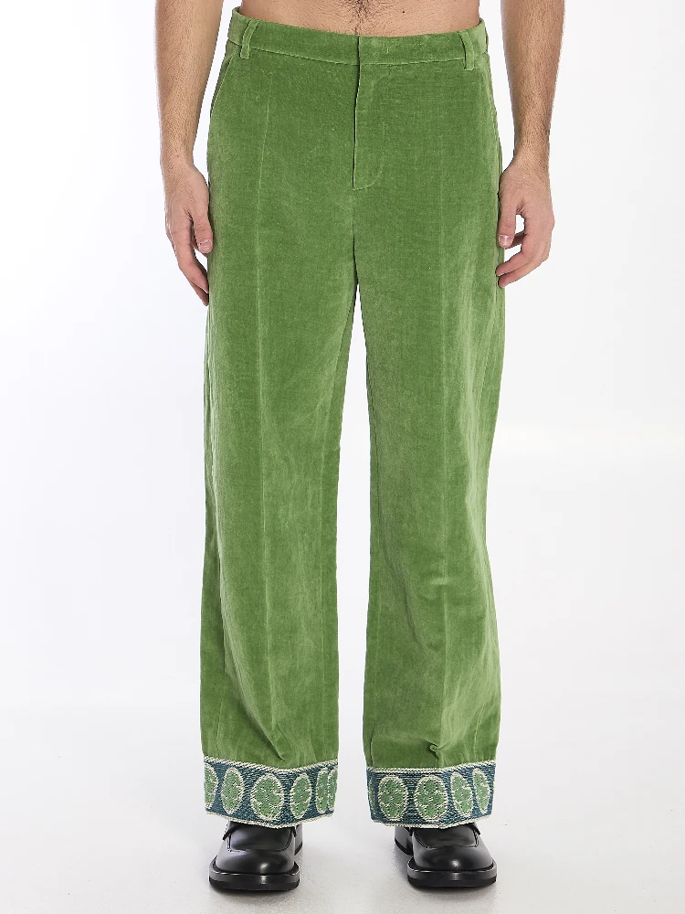 Velvet trousers with jacquard hems