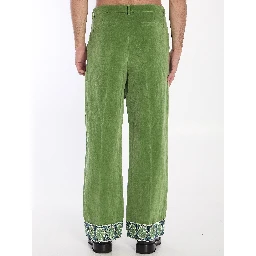 Velvet trousers with jacquard hems