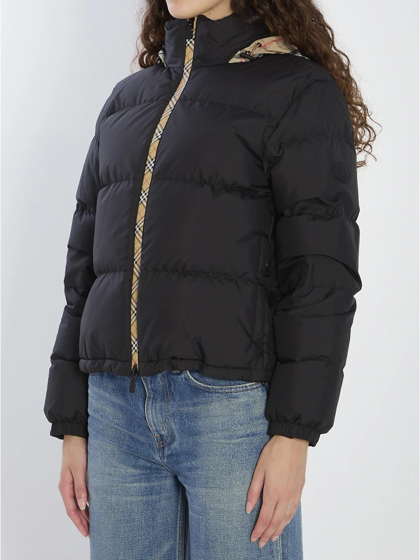 Puffer jacket with concealed hood