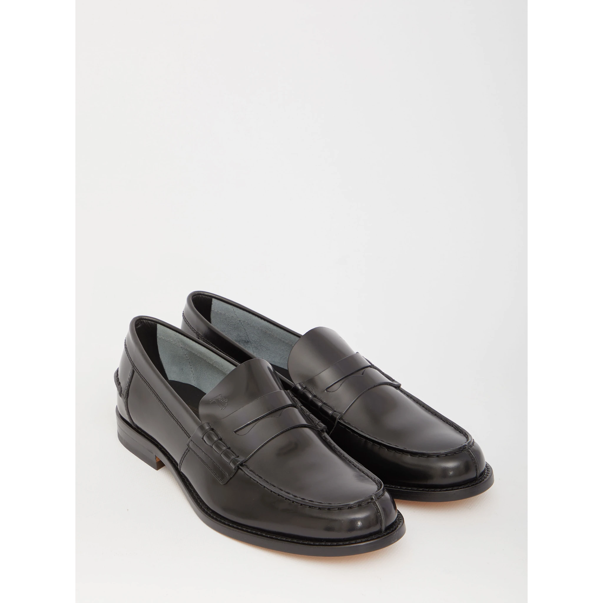 Black leather loafers
