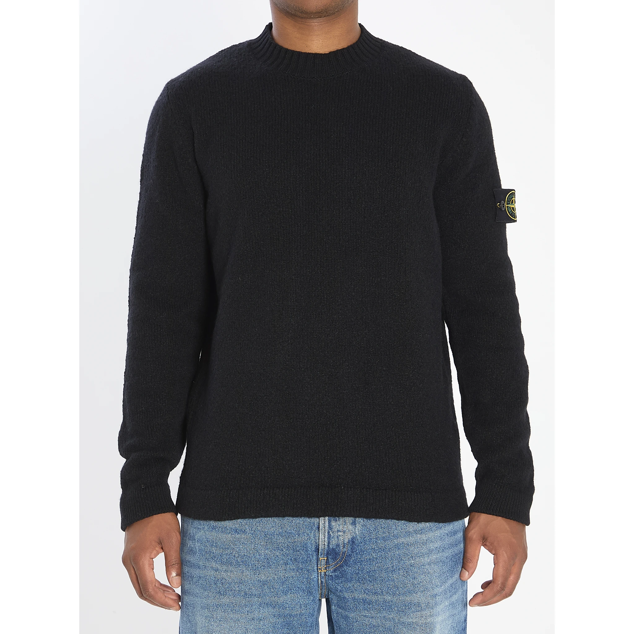 Crew neck sweater with brushed texture.