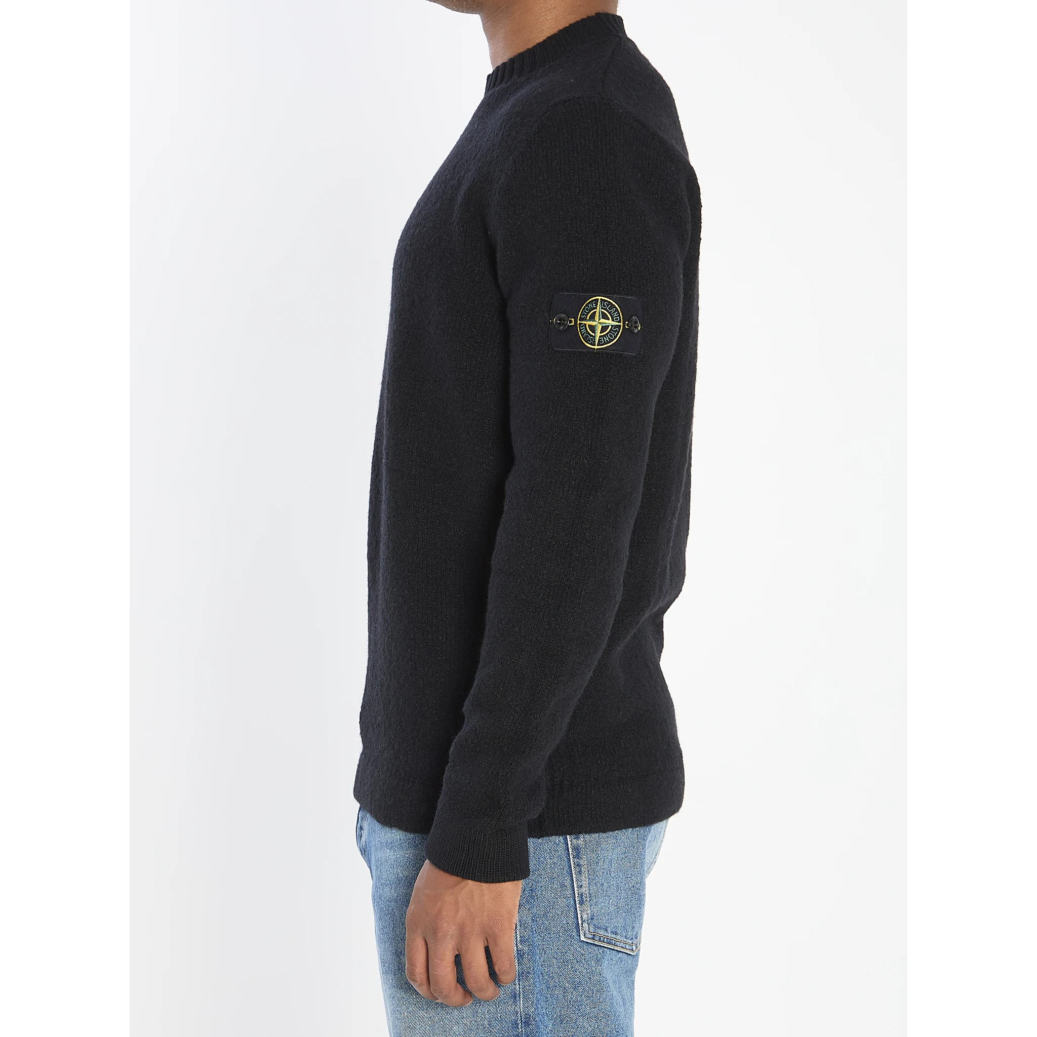 Crew neck sweater with brushed texture.