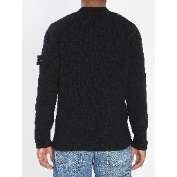 Crew neck sweater with brushed texture.
