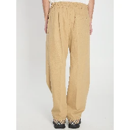Trousers with elastic band