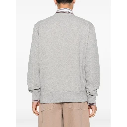 كنزات أوتري الرمادية