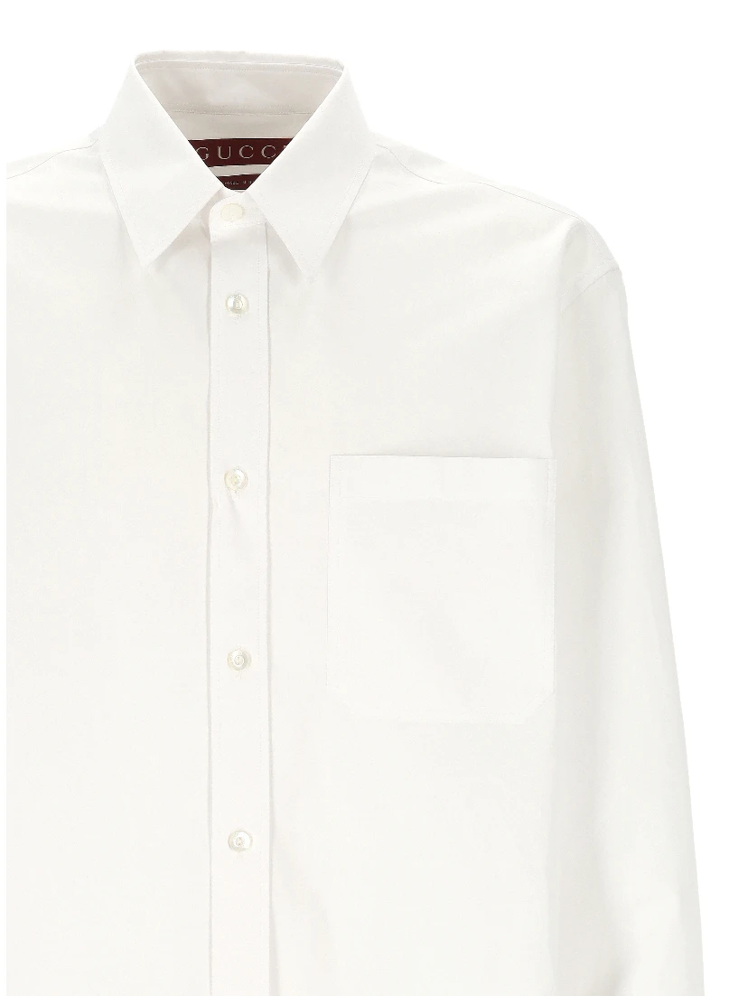 قمصان غوتشي بيضاء